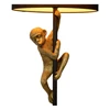 10702-81-30 chimp vloerlamp staande lamp lucide goud E27 detail chimpansee brandend